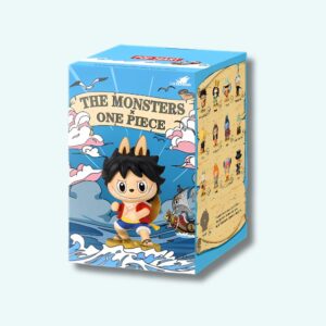Boîte bleue avec Luffy de one piece dessiné dans un style Labubu sur le devant, sur fond bleu neutre.